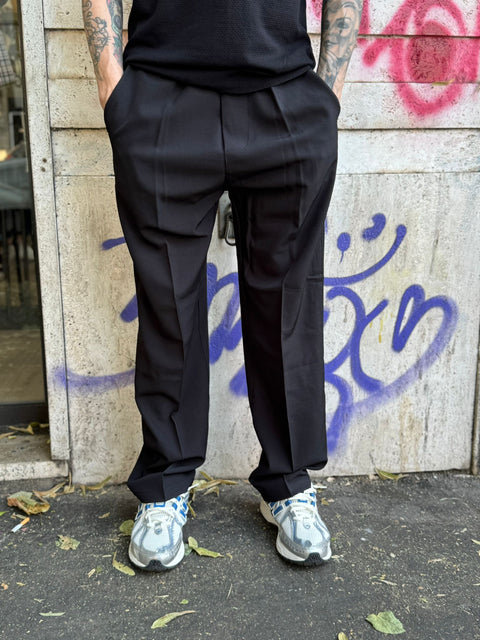 Pantalone liscio fondo ampio
